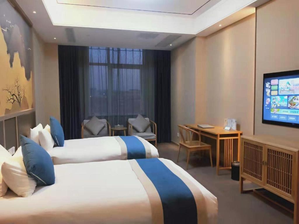 Feicheng Blossom Hotel Eksteriør bilde